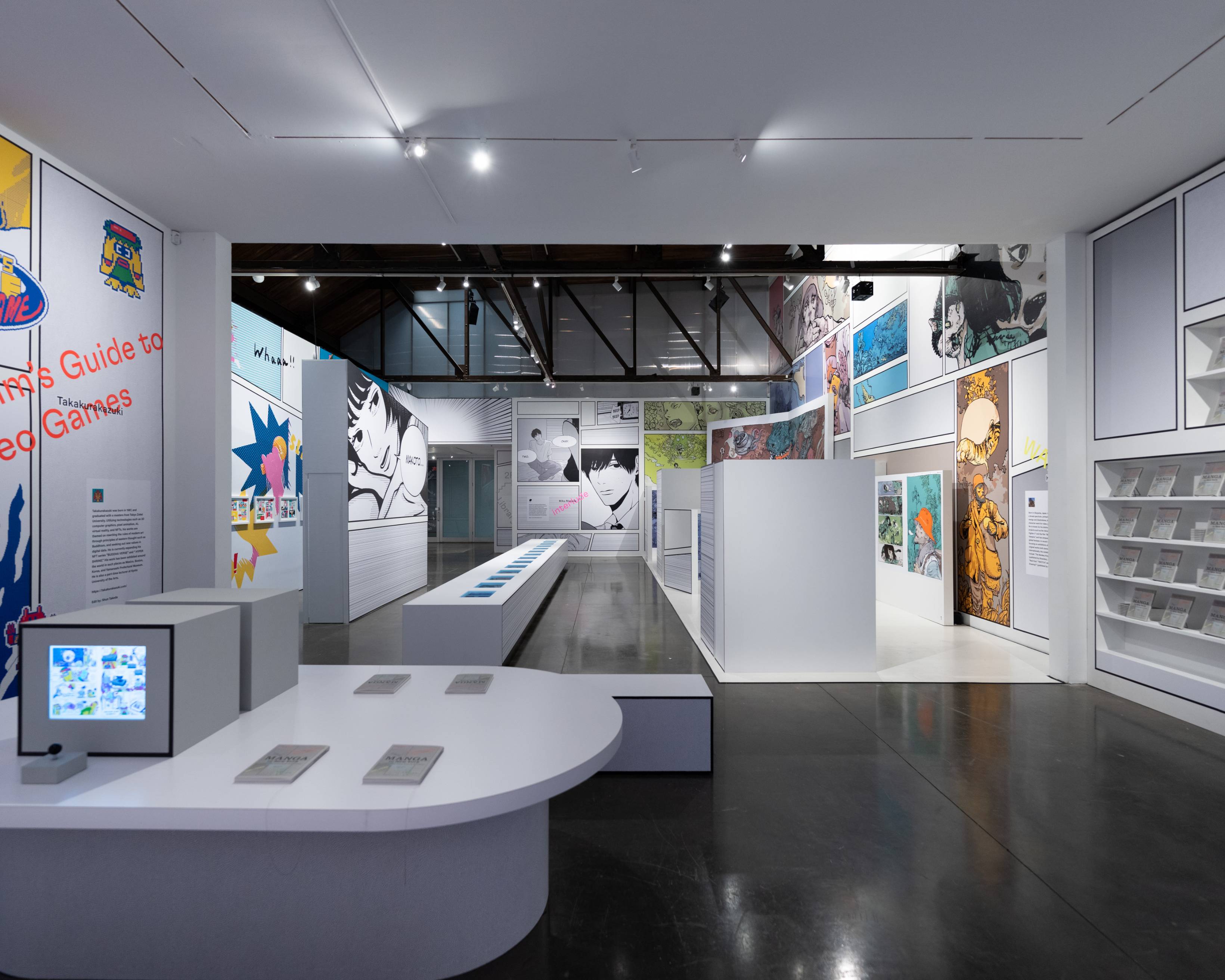 Interior. View from the center of the venue. The exhibition zones for Kazuki Takakura, Hikaru Ichijo, Miku Masuda, and Katsuya Terada are visible.